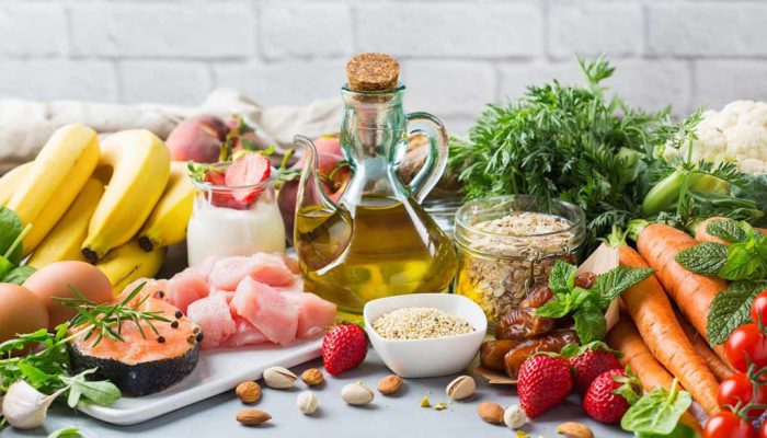 DASH flexitarian mediterranean diet to stop hypertension, low bl Balanced nutrition concept for DASH clean eating flexitarian mediterranean diet to stop hypertension and low blood pressure. Assortment of healthy food ingredients for cooking on a kitchen table.